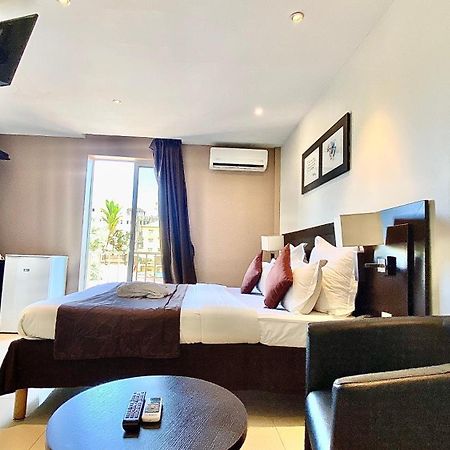 Hotel M'Lys كوناكري المظهر الخارجي الصورة